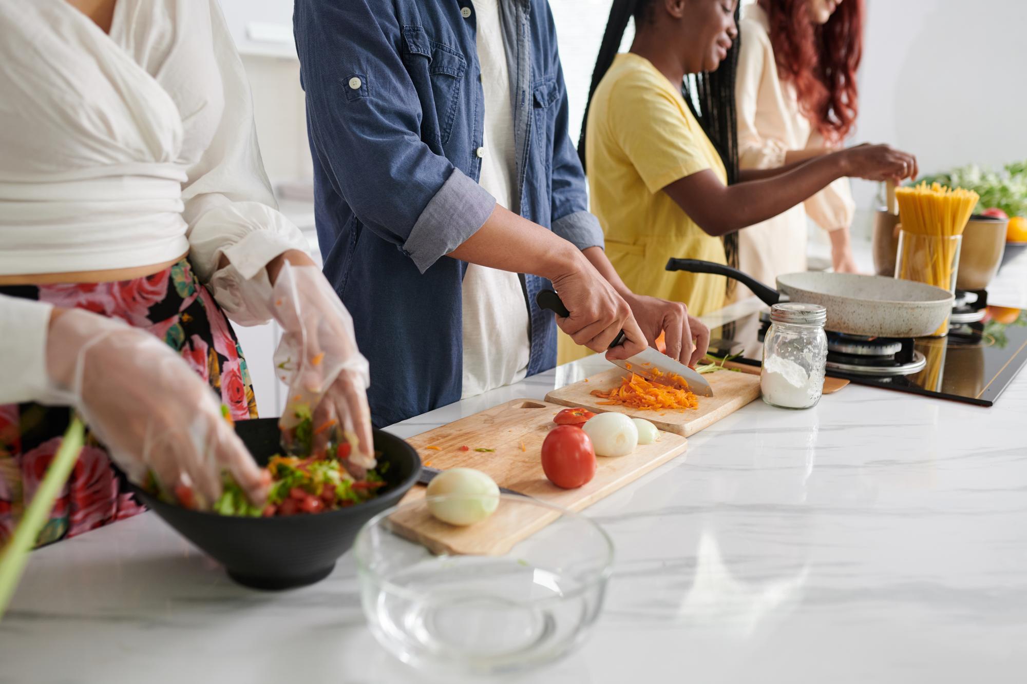 Small-group class around a prep table